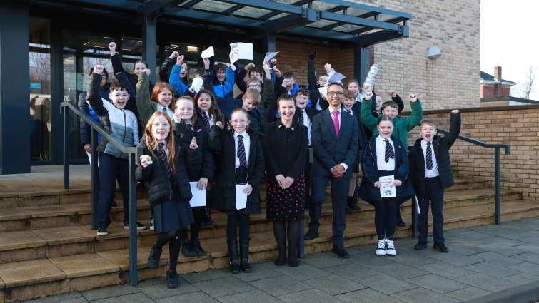 This image shows pupils from St Joseph's Primary School following a performance they gave at Blantyre Life to celebrate the facility's one year anniversary