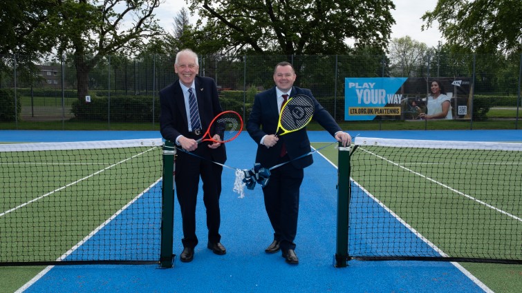 This image shows Council Leader Joe Fagan and Councillor Robert Brown at the refurbished Whitemoss tennis courts