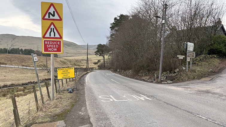 This is a view of the approach road to Elvanfoot Bridge