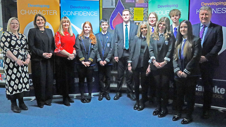 This image shows pupils, staff and invited guests at the Holocaust Memorial Day event at Carluke High School on 27 January 2025