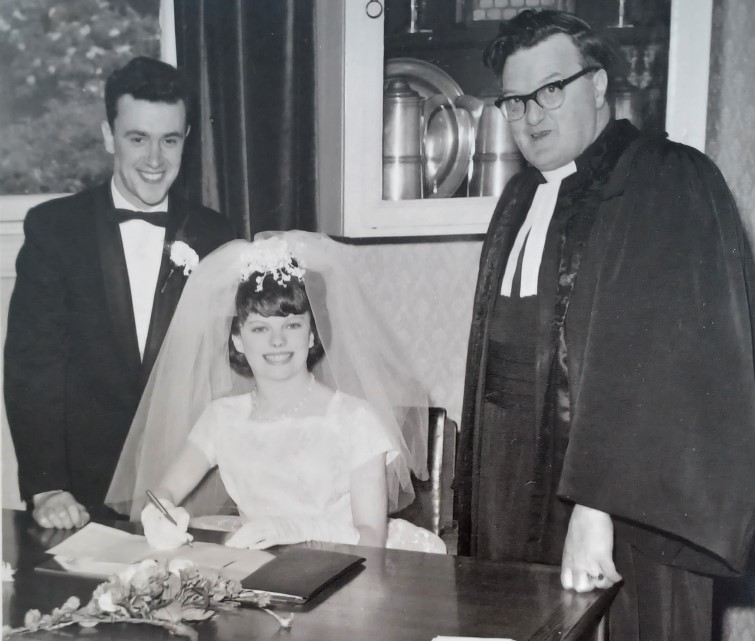 William and Alva Haig with the minister at their wedding in 1964.
